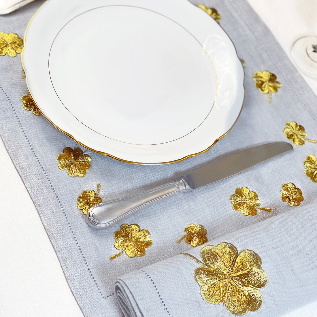 Waww La Table Golden Clover pearl-grey linen napkins by Aurélie Bidermann, set of four, styled on a table setting