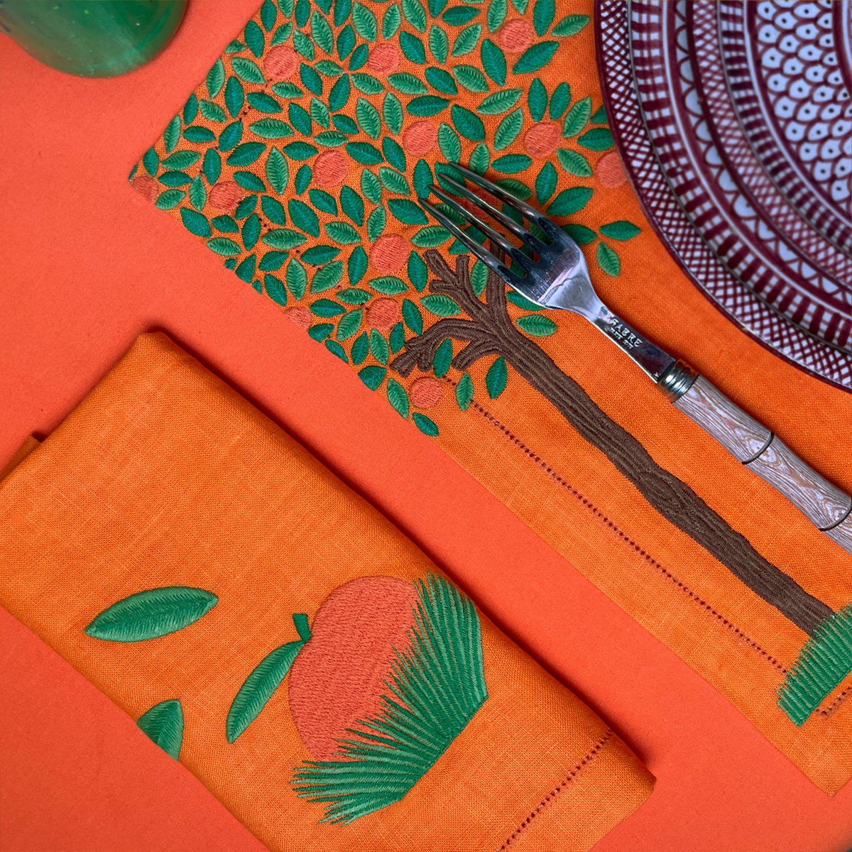 Waww La Table Oranger orange linen napkins by Aurélie Bidermann, set of four, styled on a table setting