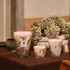 Baobab Collection Leaves Naïs 4-wick scented candle in mouth-blown glass, 1.1kg, styled in a room setting