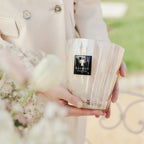 Baobab Collection Pearls White 4-wick scented candle in mouth-blown glass, 1.1kg, styled in a room setting