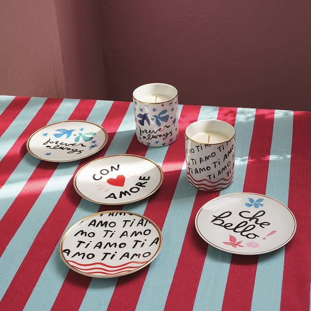 Bitossi Home Forever Always scented candle in a decorated porcelain vessel, styled in a table setting