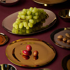 Bitossi Home Senza Tempo gold-edged porcelain underplate, 30.5cm, styled in a table setting