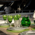 Mario Luca Giusti Dolce Vita Wine Glass, Green in synthetic crystal, styled in a table setting