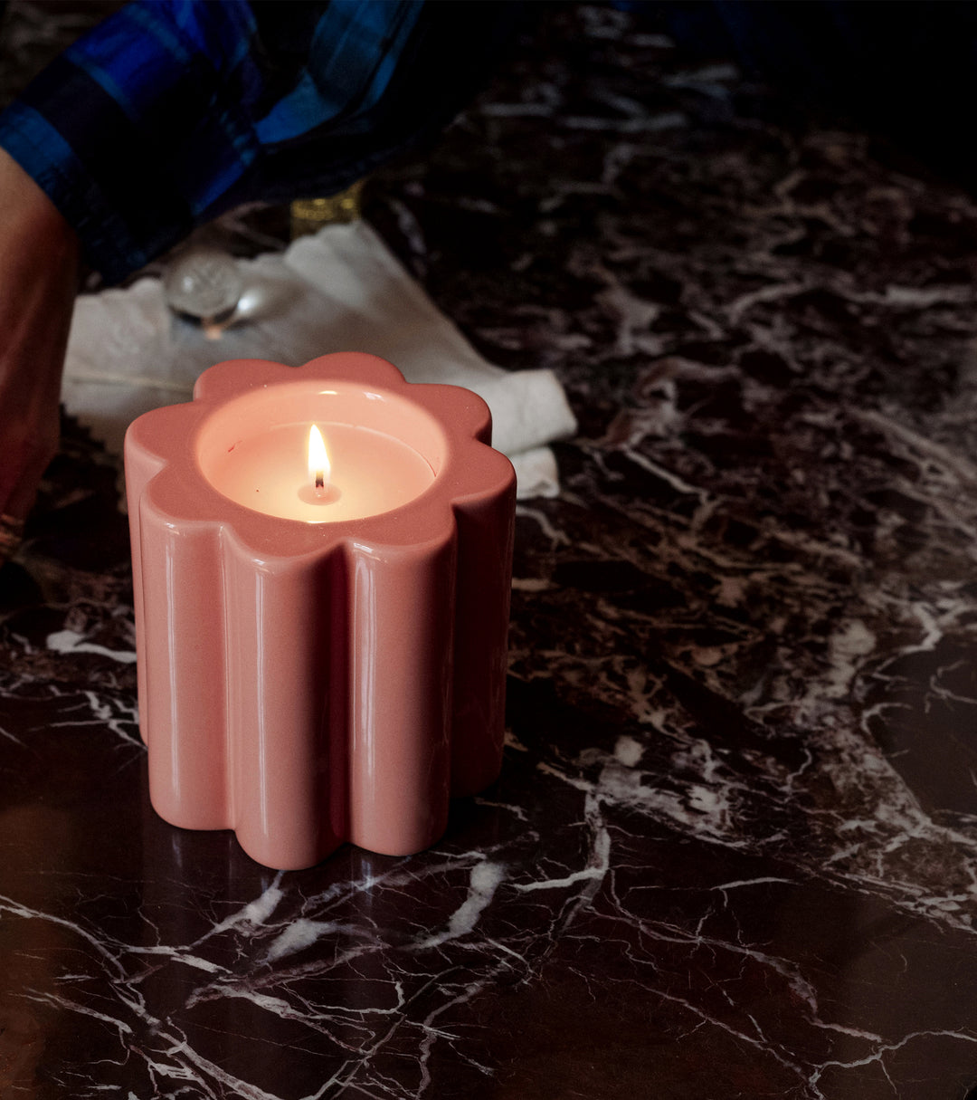 The Socialite Family Candela fig tree scented candle in a powder pink ceramic vessel, 240g, styled in a room setting 4