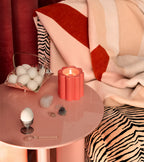 The Socialite Family Candela fig tree scented candle in a powder pink ceramic vessel, 240g, styled in a room setting