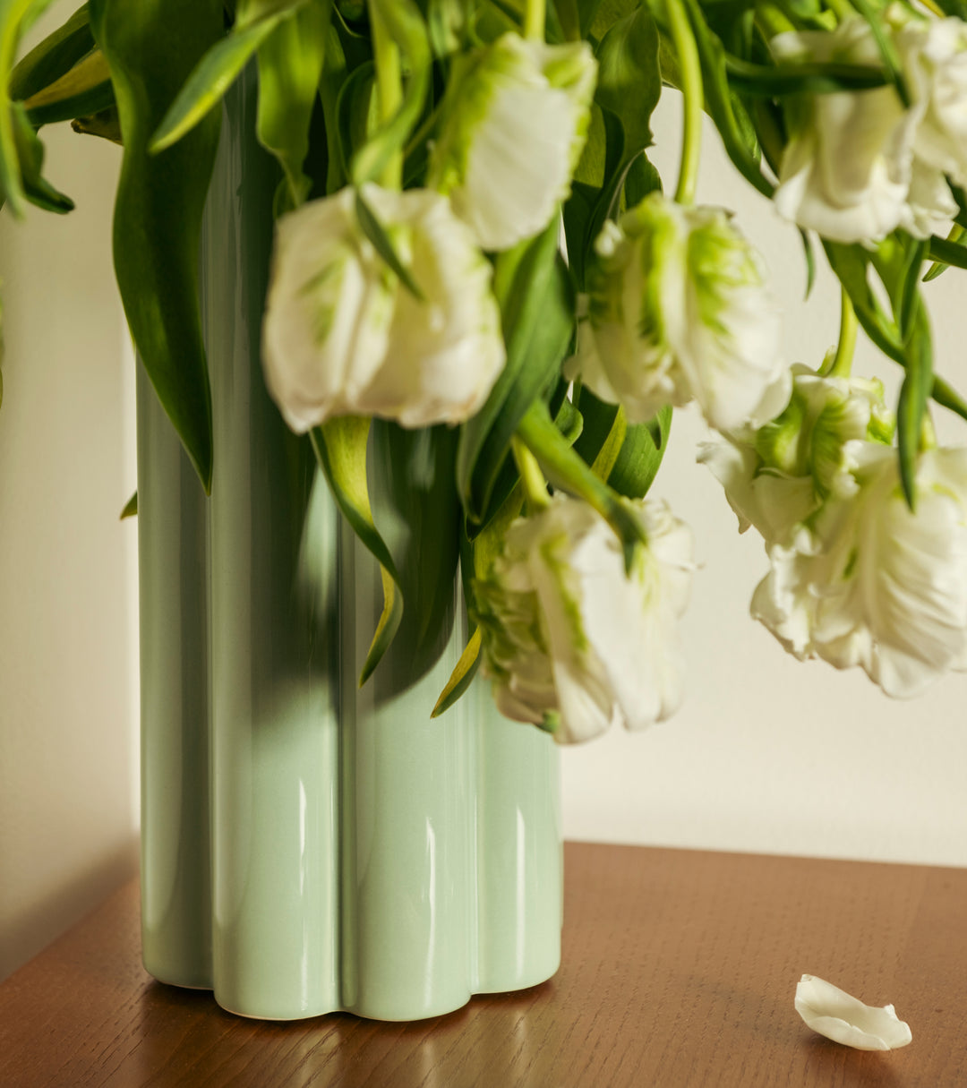 The Socialite Family Duetto Solo vase in almond green ceramic, 27cm, styled in a room setting 2