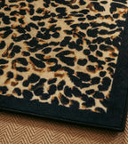 The Socialite Family Leopardo rug in leopard print, 150x200cm, styled in a room setting 2
