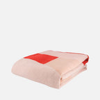 The Socialite Family Roma merino wool throw in beige and pink, 150x200cm, front view 2