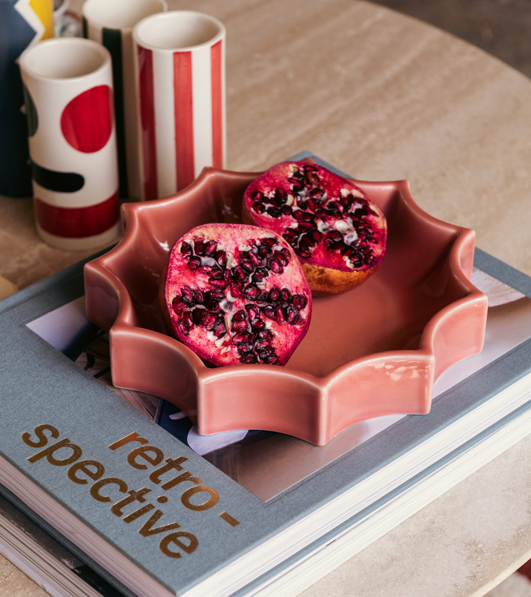 The Socialite Family Tasca décor tray in soft pink glazed ceramic, 22cm, styled in a room setting 2