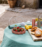 The Socialite Family Tasca décor tray in soft pink glazed ceramic, 22cm, styled in a room setting 3
